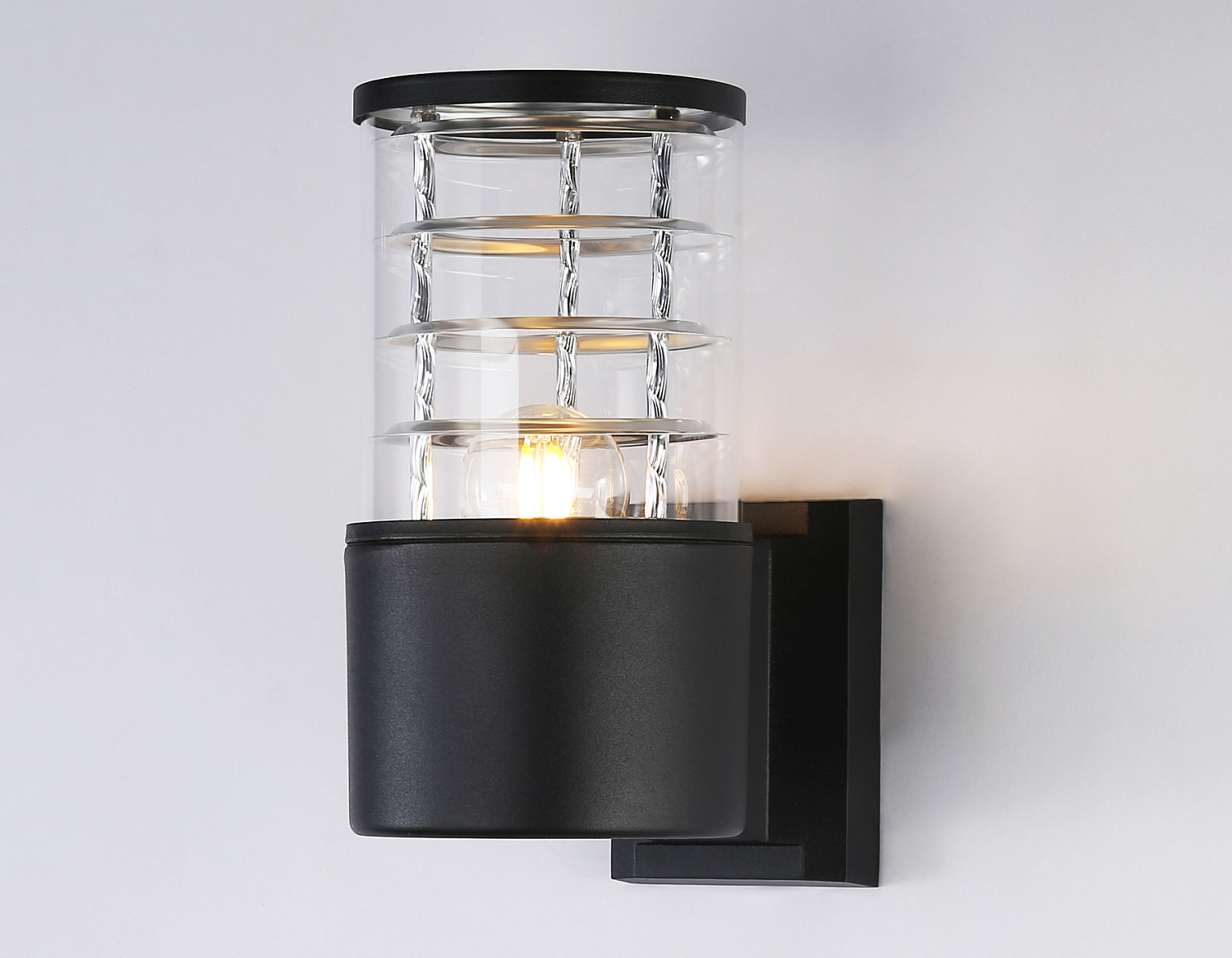 Уличный настенный архитектурный светильник ST2522 BK/CL черный/прозрачный IP54 E27 max 11W 200*110*155